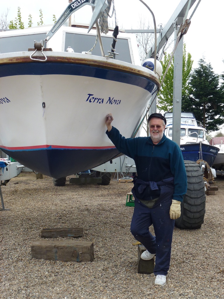 Mort Smith stands beside the bow of Terra Nova Mort Smith stands beside the bow of Terra Nova