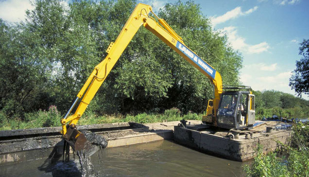 A rare sight on the upper Thames these days - a dredger at work